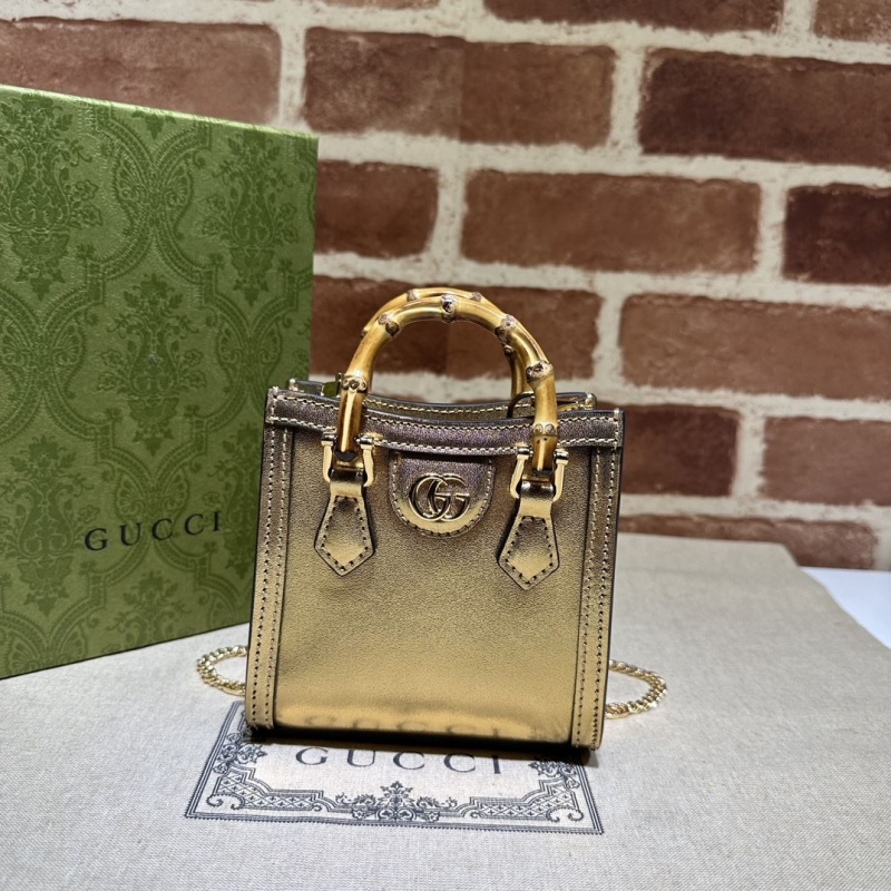 G*u*i top handle bags